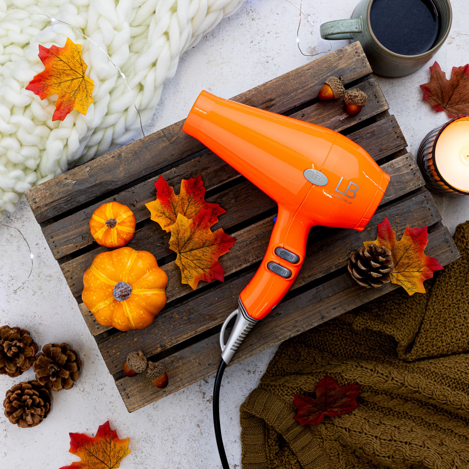 Orange styling tool in a seasonal arrangement