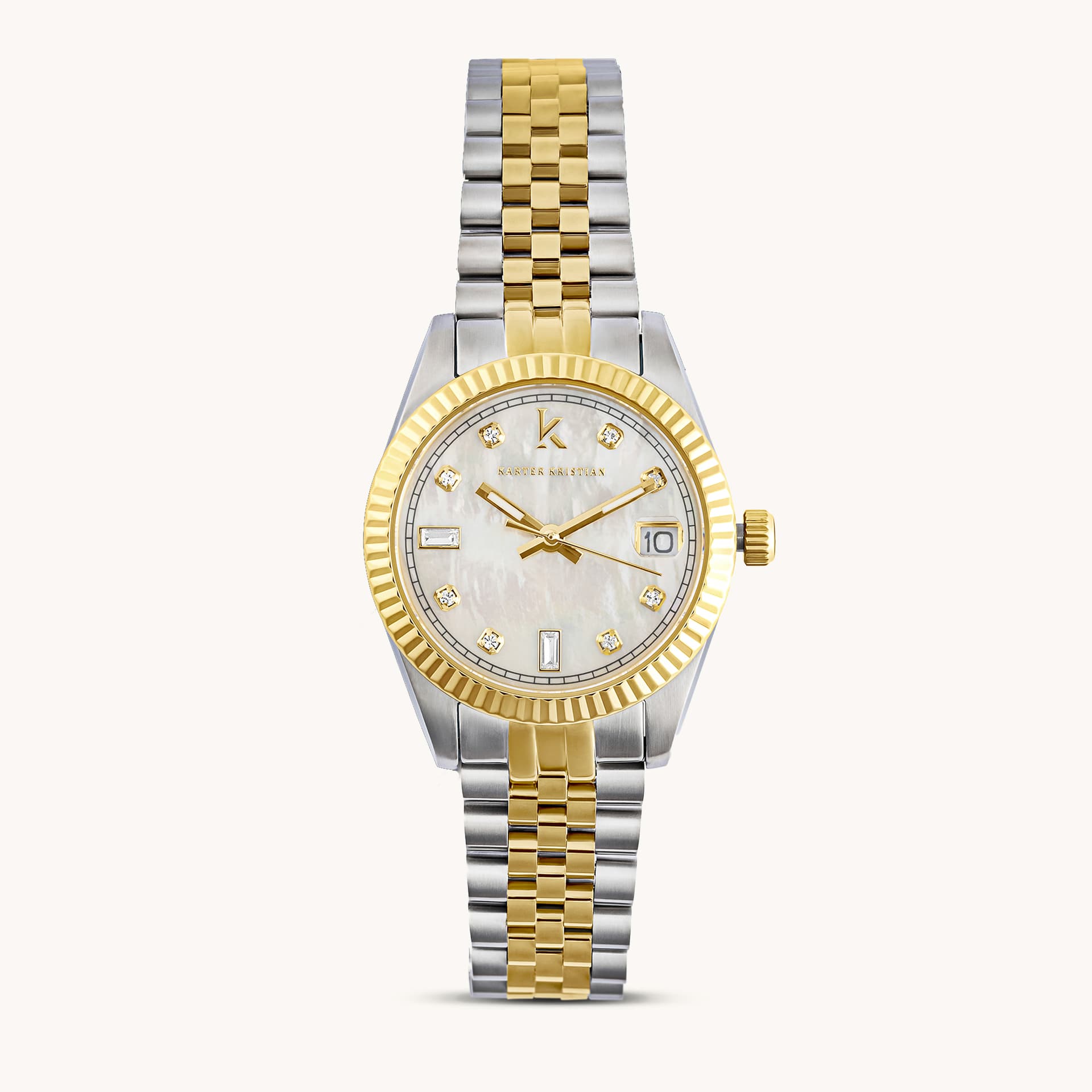 Two-tone metal watch photographed against white