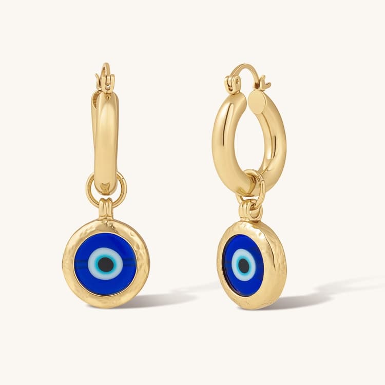 Gold-tone earrings with blue pendants