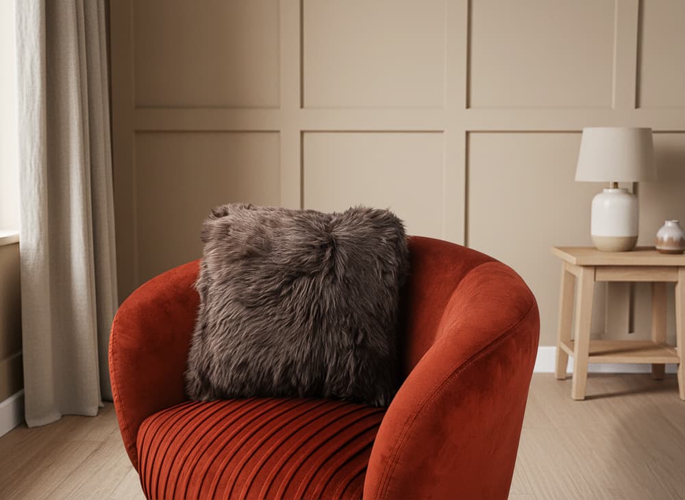 Dark brown cushion in styled room composite setting - digital composite photography UK